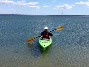 A man is boating.